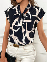 Printed Tie Neck Cap Sleeve Blouse