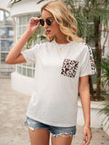 Ivy Lane Pocketed Leopard Round Neck Short Sleeve T-Shirt