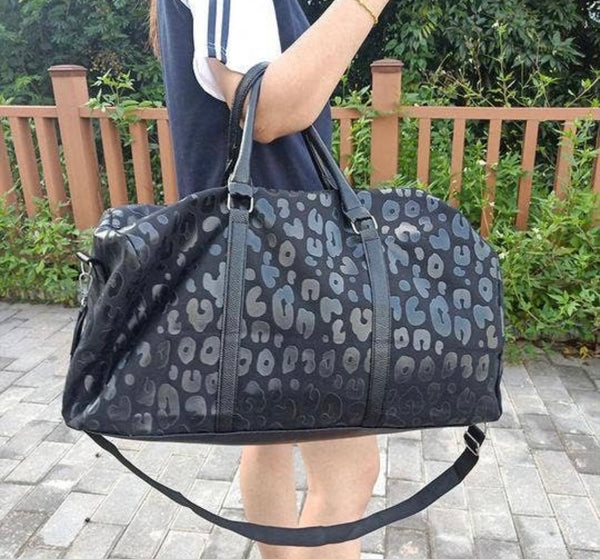 Black leopard getaway bag