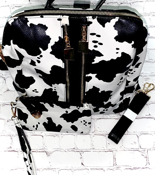 Cow Print Multifunctional Backpack + Wristlet